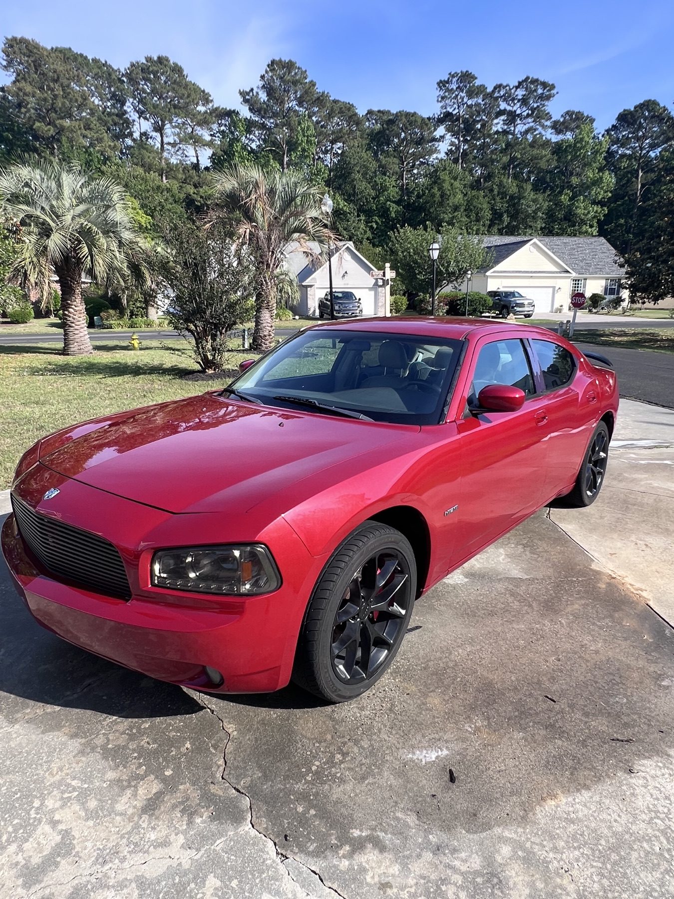 A red Dodge Charger freshly detailed by MBAD
